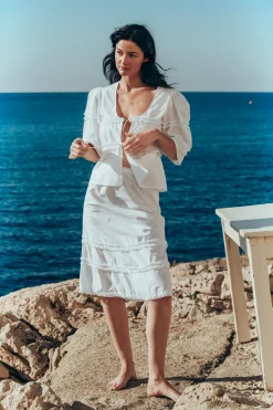MaisonCléo Jupes>Jupe MARGOTON mi-longue évasée en coton blanc avec détails froufrous