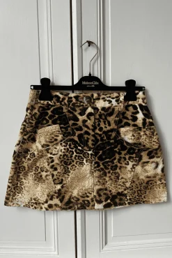MaisonCléo Jupes>Mini jupe en velours milleraies et poches léopard